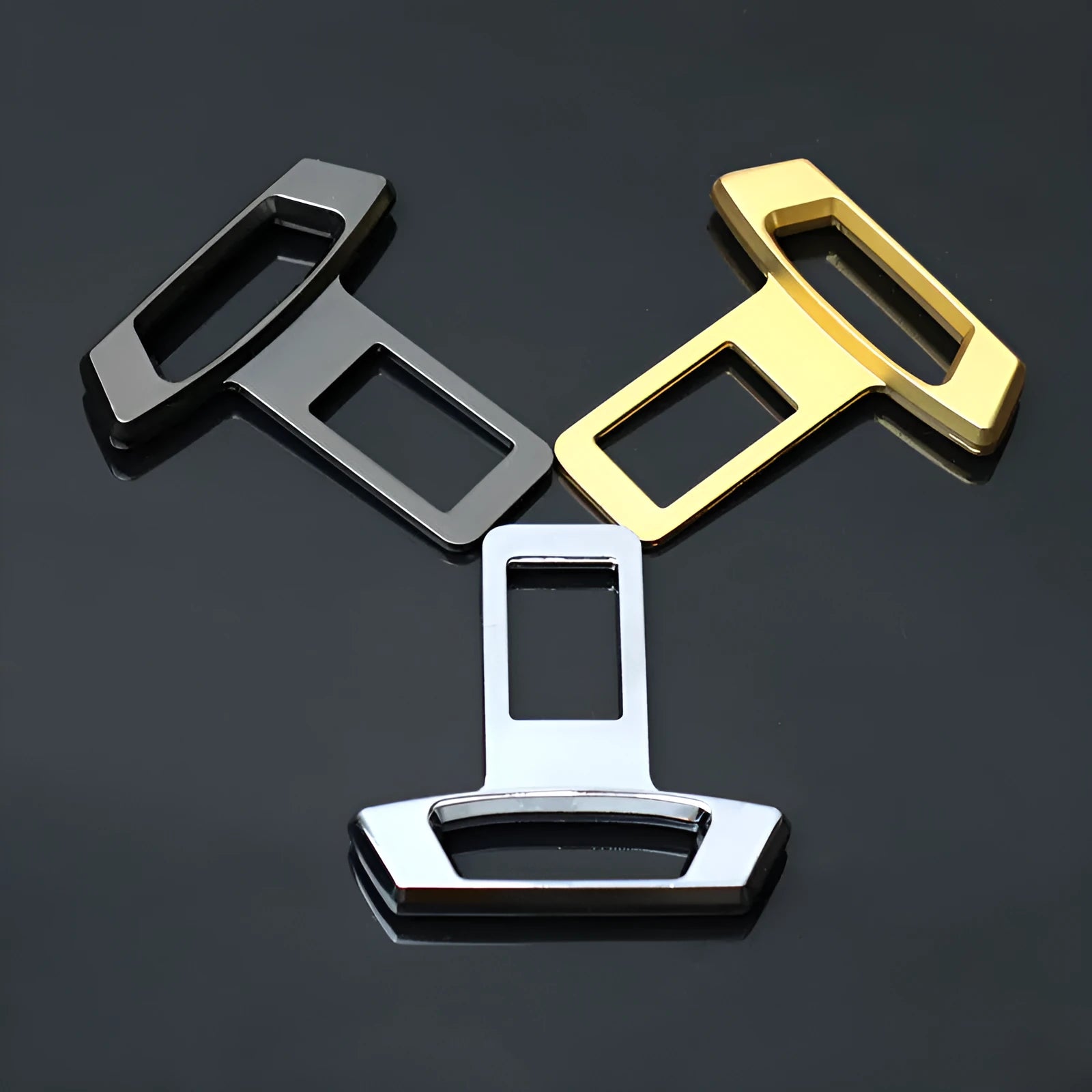 Metal car silencer insert in matte black, gold, and silver colour options.