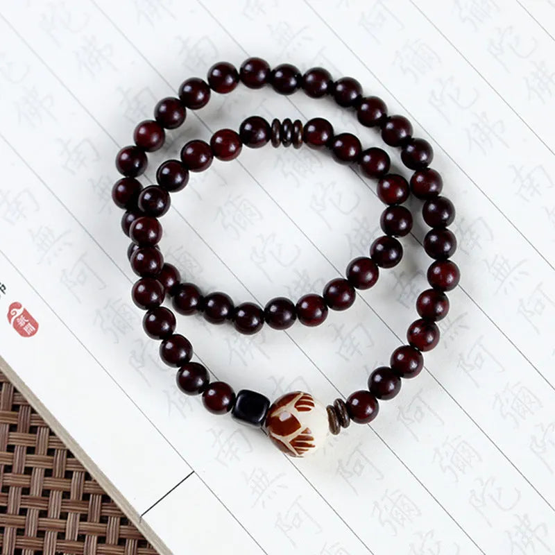 Natural rosewood double-ring bracelet with hand-knitted construction and flower-shaped beads