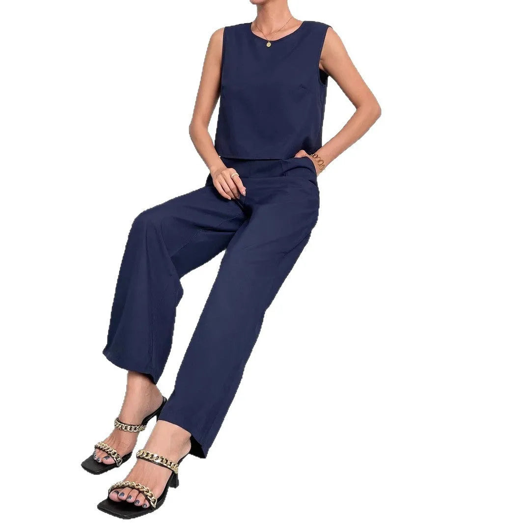Red sleeveless top and wide-leg trousers two-piece set on a hanger.