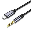 Silver nylon-braided audio cable with 3.5mm connectors on a plain background.