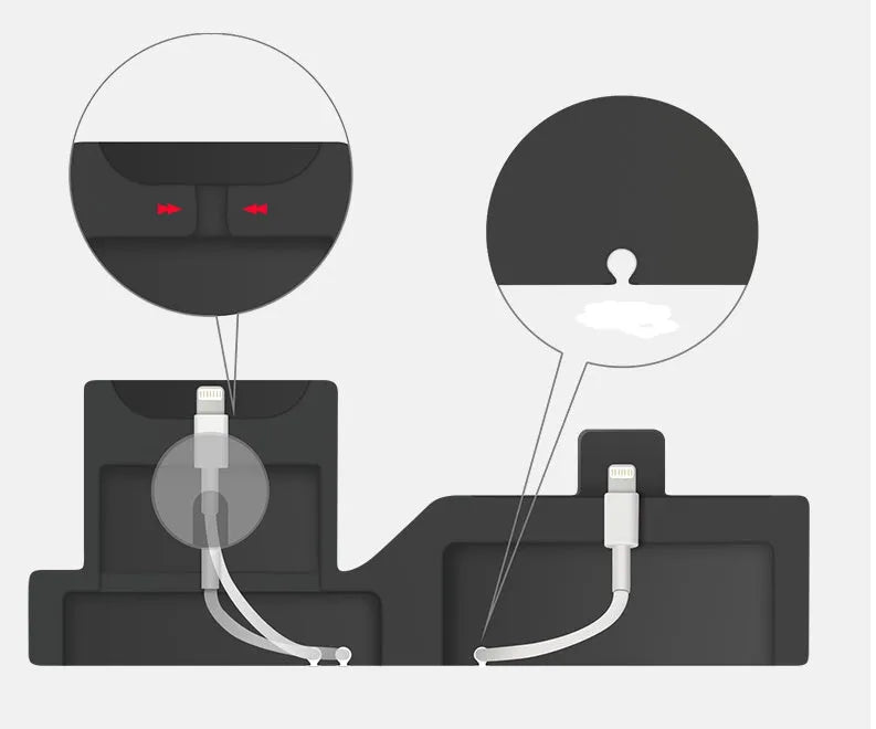 Black 3-in-1 silicone charging base for iPhone, iWatch, and AirPods on a desk