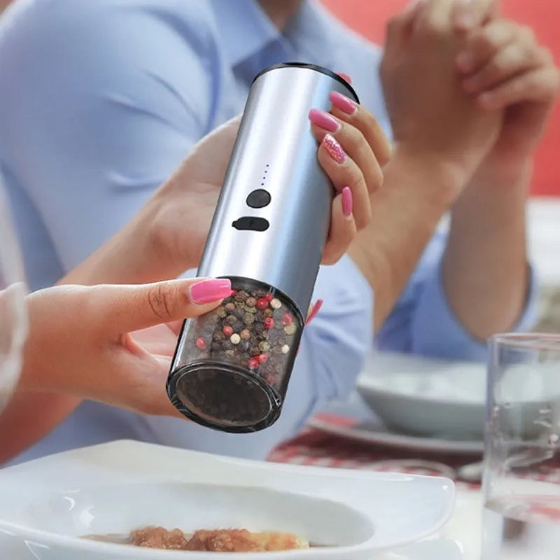 White electric salt and pepper grinder set with LED light and USB charging base