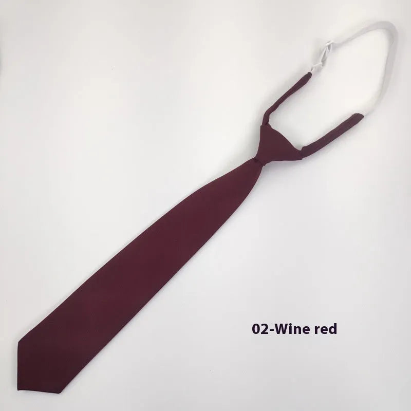 Navy blue cotton bow tie with arrow style design measuring 35cm by 7cm