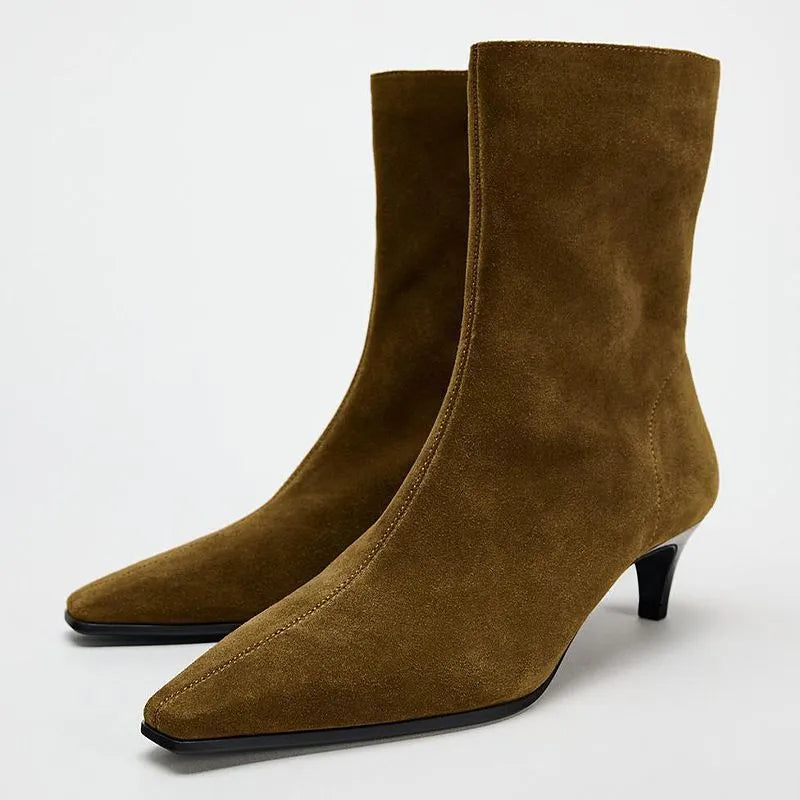 Brown women's square toe mid-calf boots with a side zipper and a low kitten heel on a waterproof platform sole.