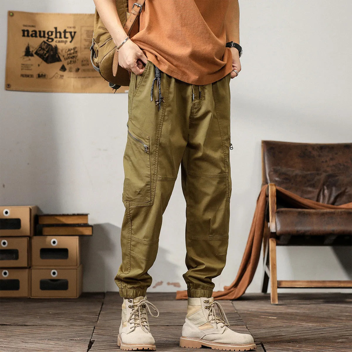 Men's tapered harem trousers in cotton fabric with elastic waist and ankle banding detail