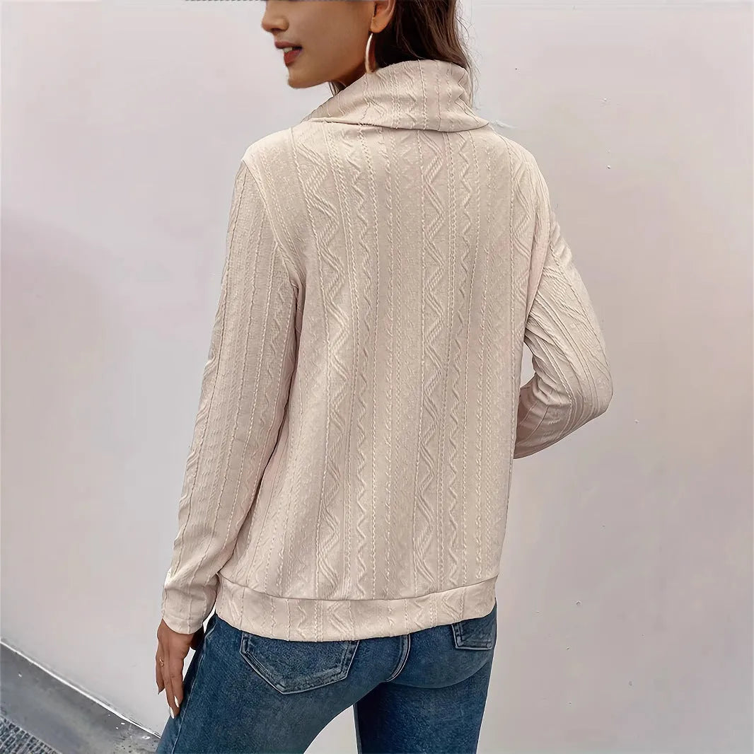 Apricot coloured women's hooded pullover sweater with long sleeves and drawstring adjustment