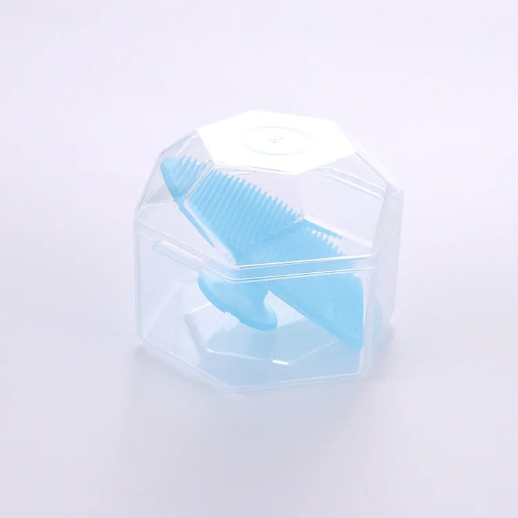 Silicone facial brush with three bristle types: tiny, middle, coarse; blue colour; 53mm size; for face cleansing and massage.