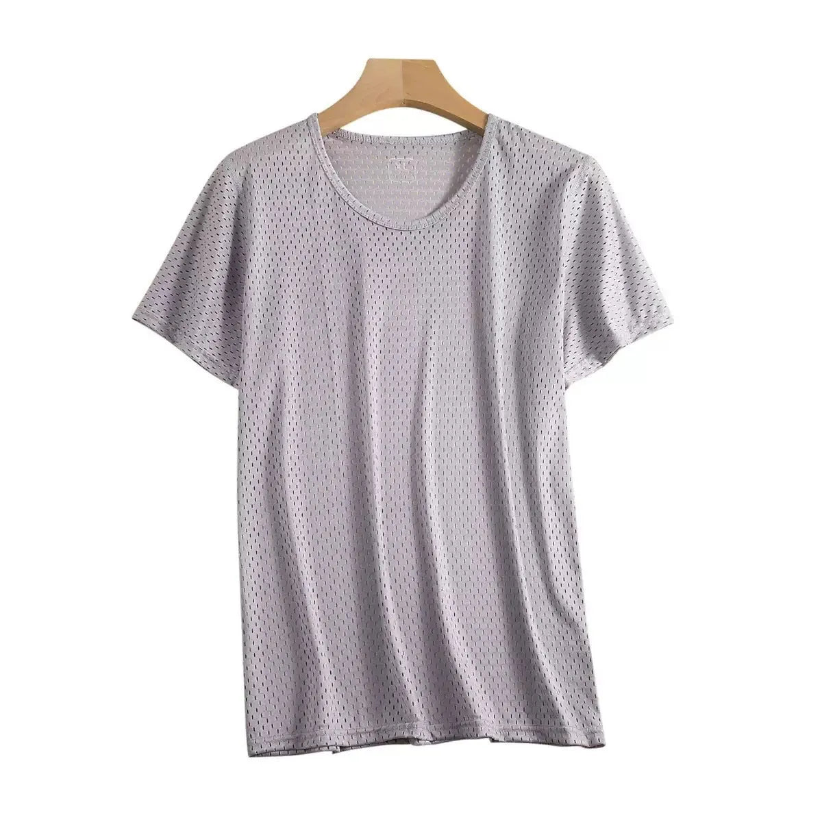 Man wearing a loose-fit black Ice Silk short sleeve t-shirt with crew neck for summer.