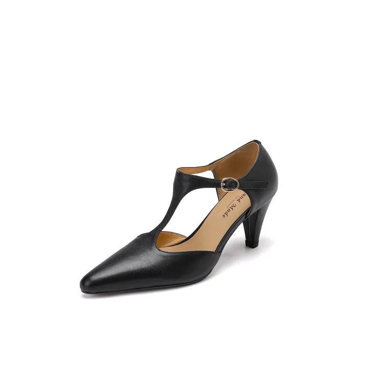 Women's brown retro T-bar strap sandals with a closed round toe and a chunky leather heel.