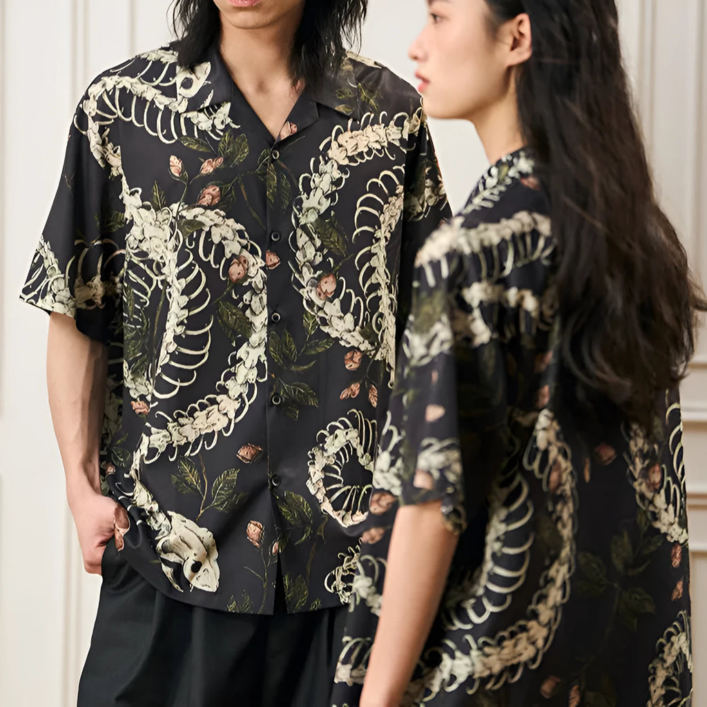 Short sleeve Cuban collar shirt with original snake bone and floral pattern print in a loose fit.
