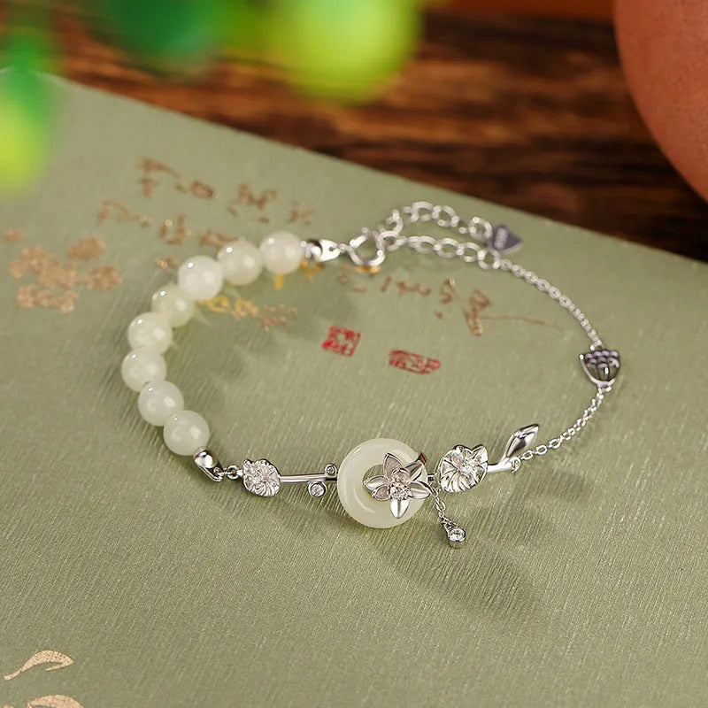 Hetian jade peace buckle bracelet in gold-plated 925 silver with lotus pattern for women
