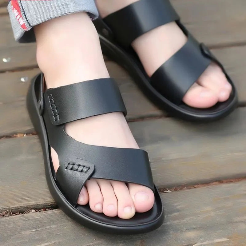 Men's brown casual waterproof plastic beach sandals on a sandy surface