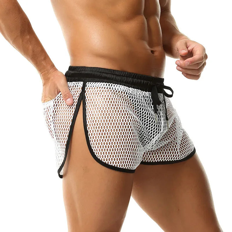 Men's loose breathable polyester boxers in solid colour, black, front view on plain background