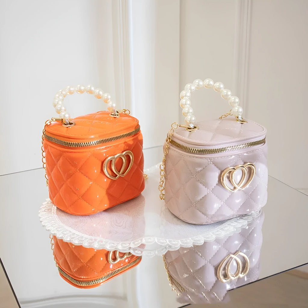 PVC bucket gel bag for women with heart pattern in choice of seven colours.