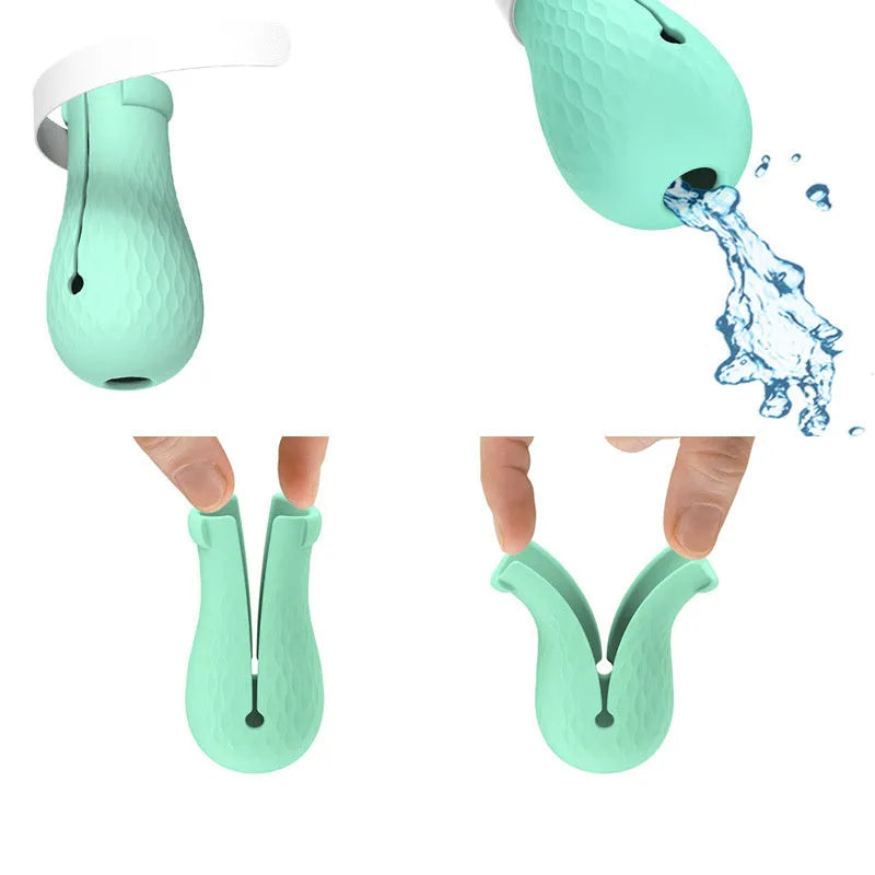 Four green silicone cat foot covers for scratch protection during pet washing and medicine administration