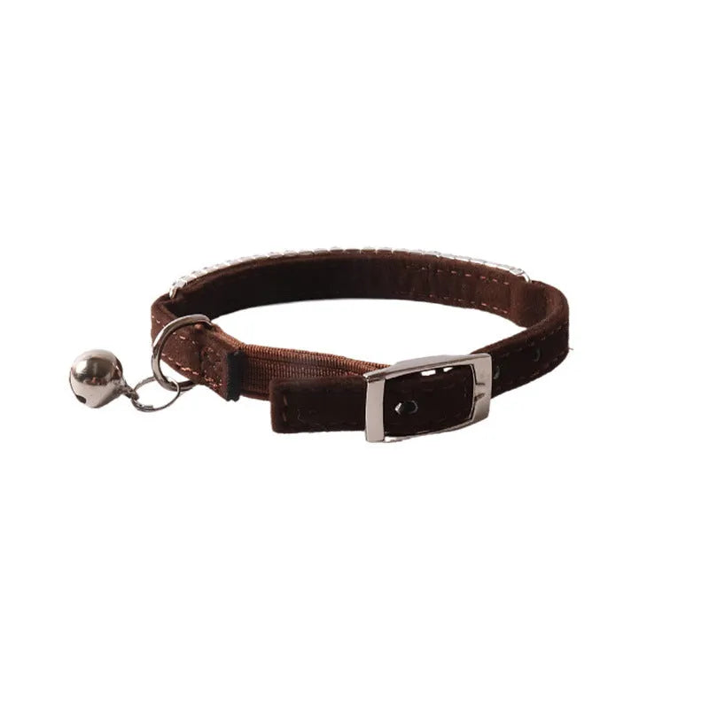 Cat collar with elastic buckle in six colour options including pink, black, red, blue, purple, dark brown