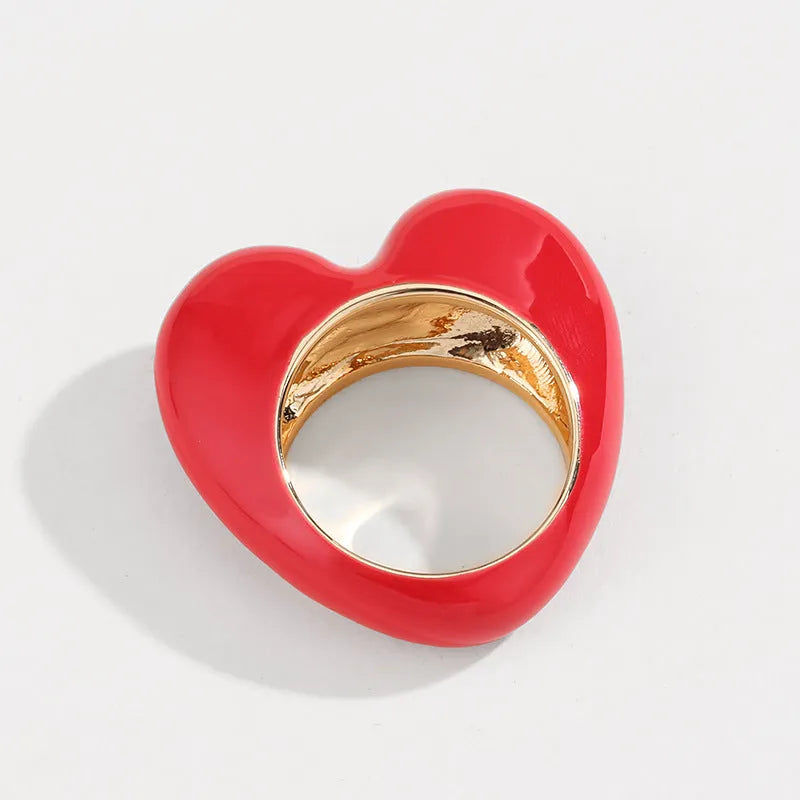 Original design heart-shaped enamel ring in zinc alloy showing three-dimensional detail.