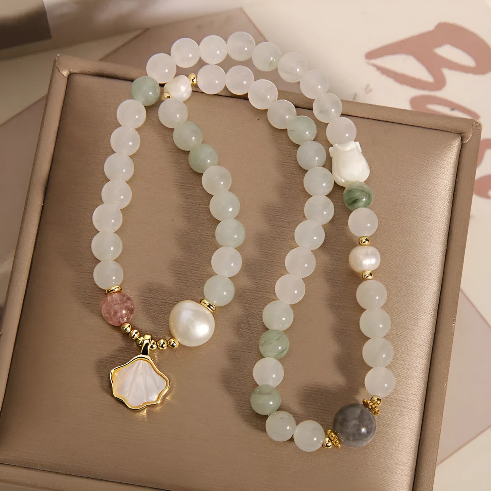 Women's crystal bracelet with Tianshan jade ginkgo leaf pendant and gold-plated setting