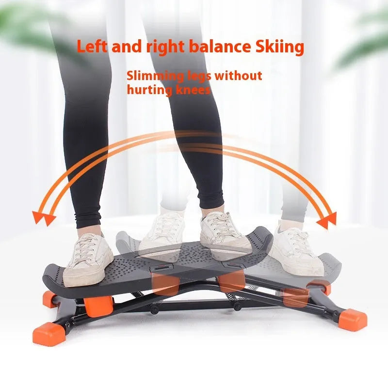 Black mini fitness skiing machine JS101A with elastic hand straps for home workouts.