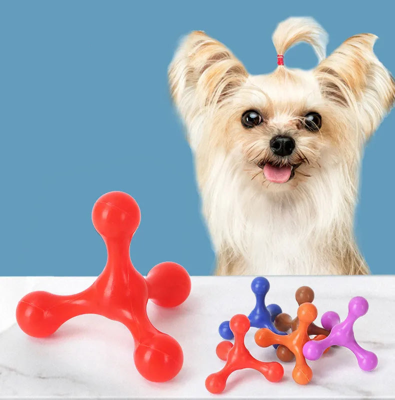 Blue silicone puppy chew toy shaped like a bone with three legs on a white background.
