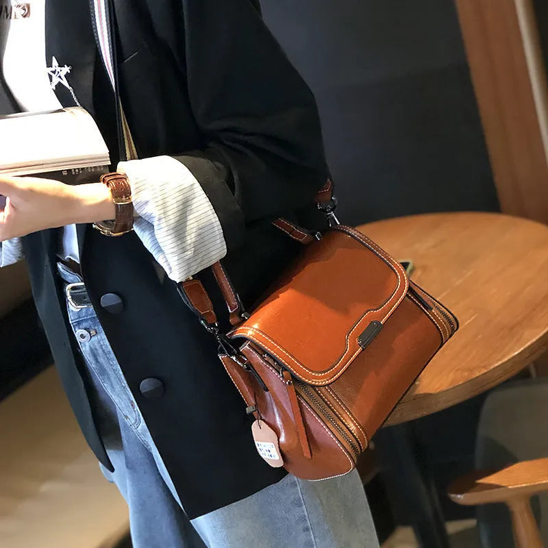 Women's genuine leather retro messenger bag in horizontal square shape with internal organiser pockets