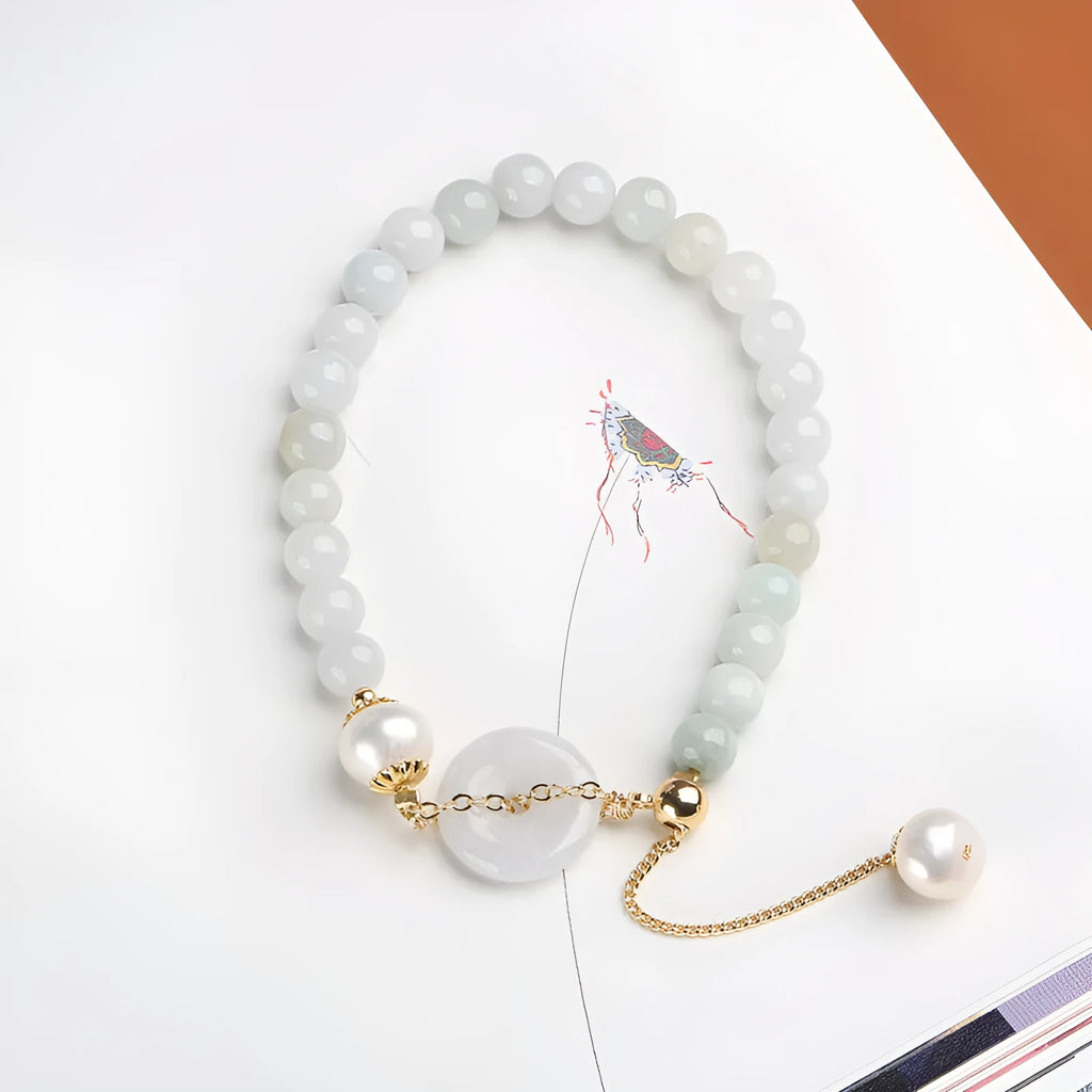 Traditional jade bracelet with peace buckle charm and pearl accents for women