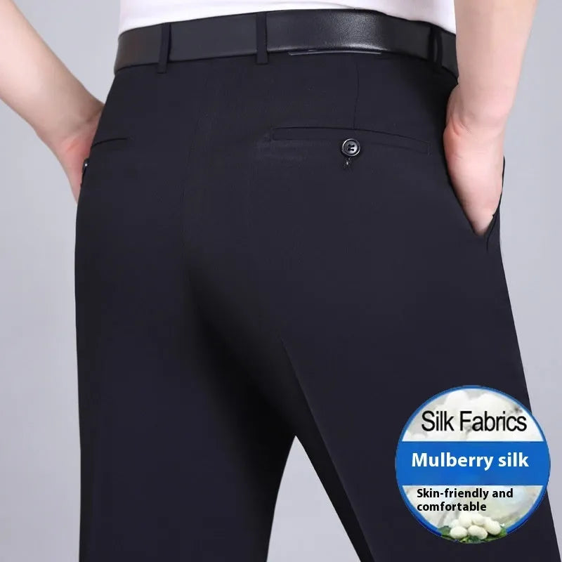Men's straight-leg mulberry silk blend suit pants in dark blue on a hanger.