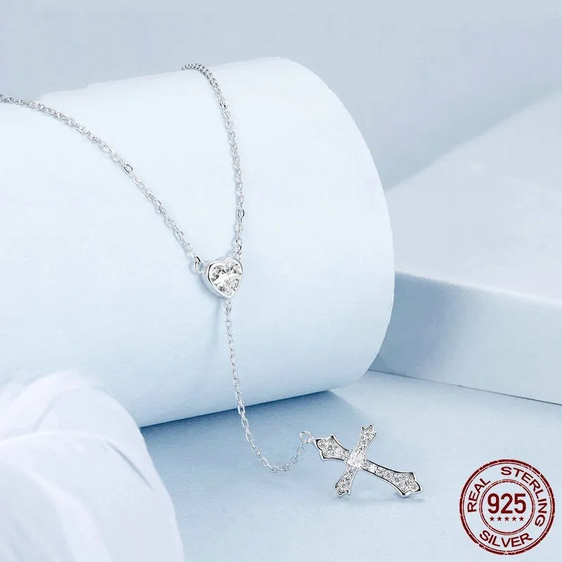Silver cross necklace with V-neck pendant on an O-ring chain for women