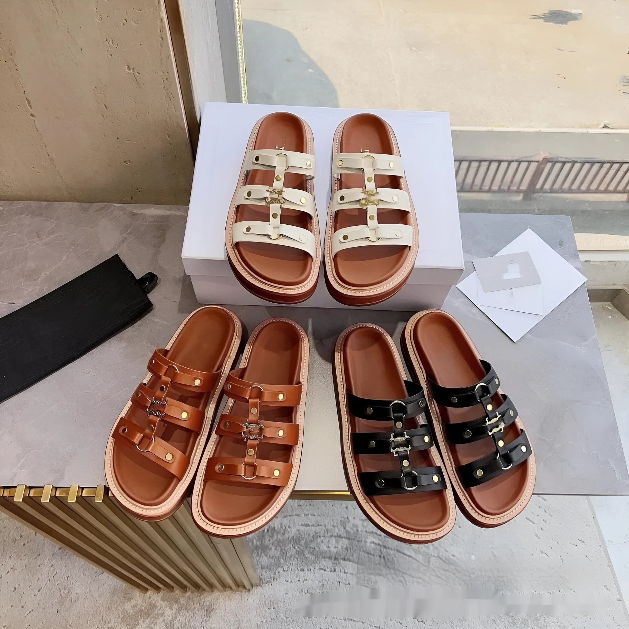 Women's retro Roman sandal slippers in patent leather finish showing strap design