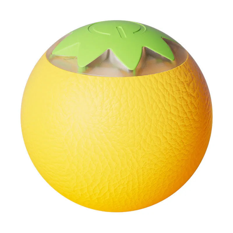 Automatic rolling ball toy for dogs and cats in green colour on floor