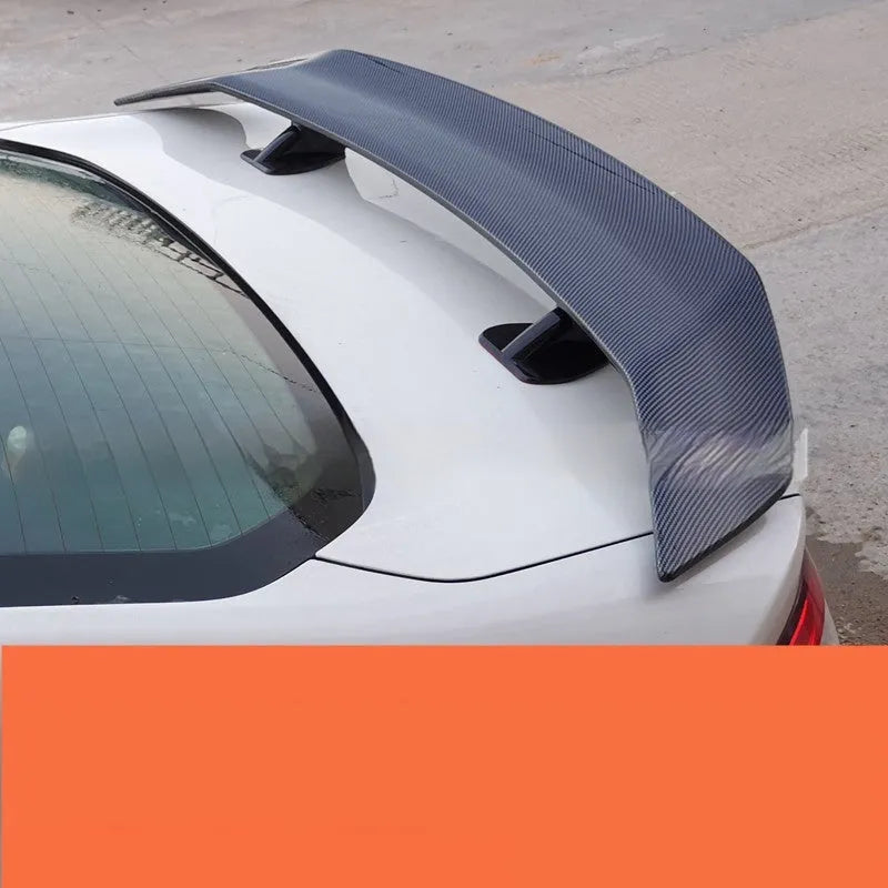 Universal punch-free ABS plastic car rear spoiler in choice of finishes for boot lid mounting.