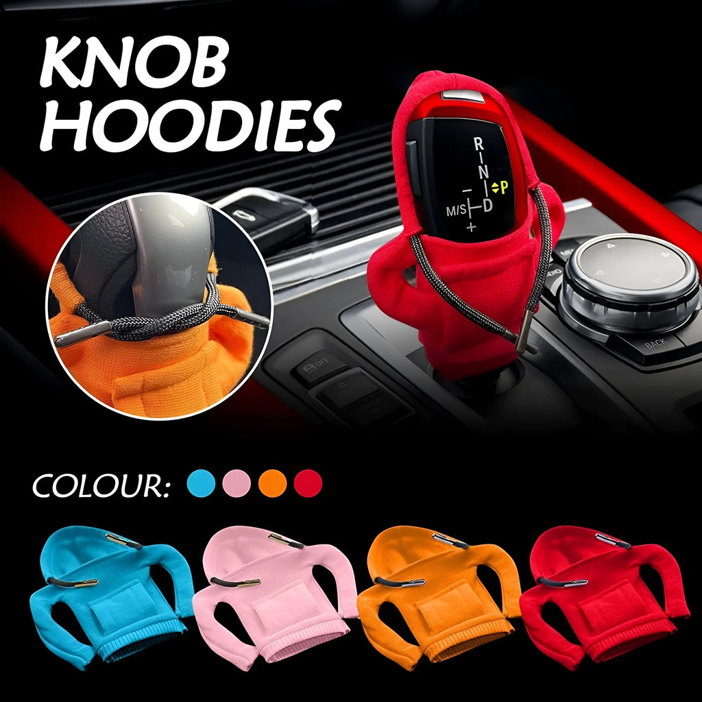 Cloth gear shift knob hoodie cover in various colours on a car gear stick.