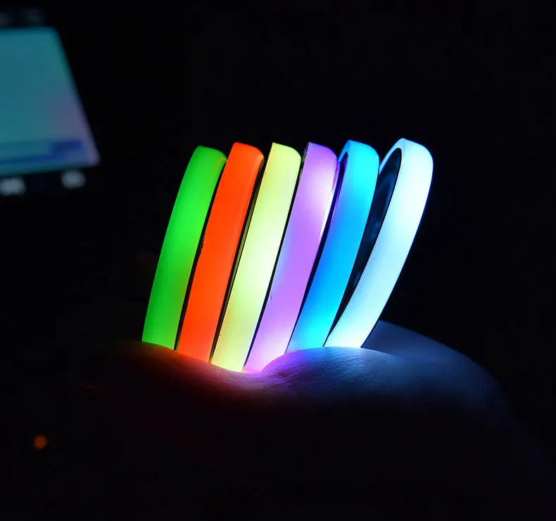 Colourful LED light-up coaster in car cup holder with seven lighting options