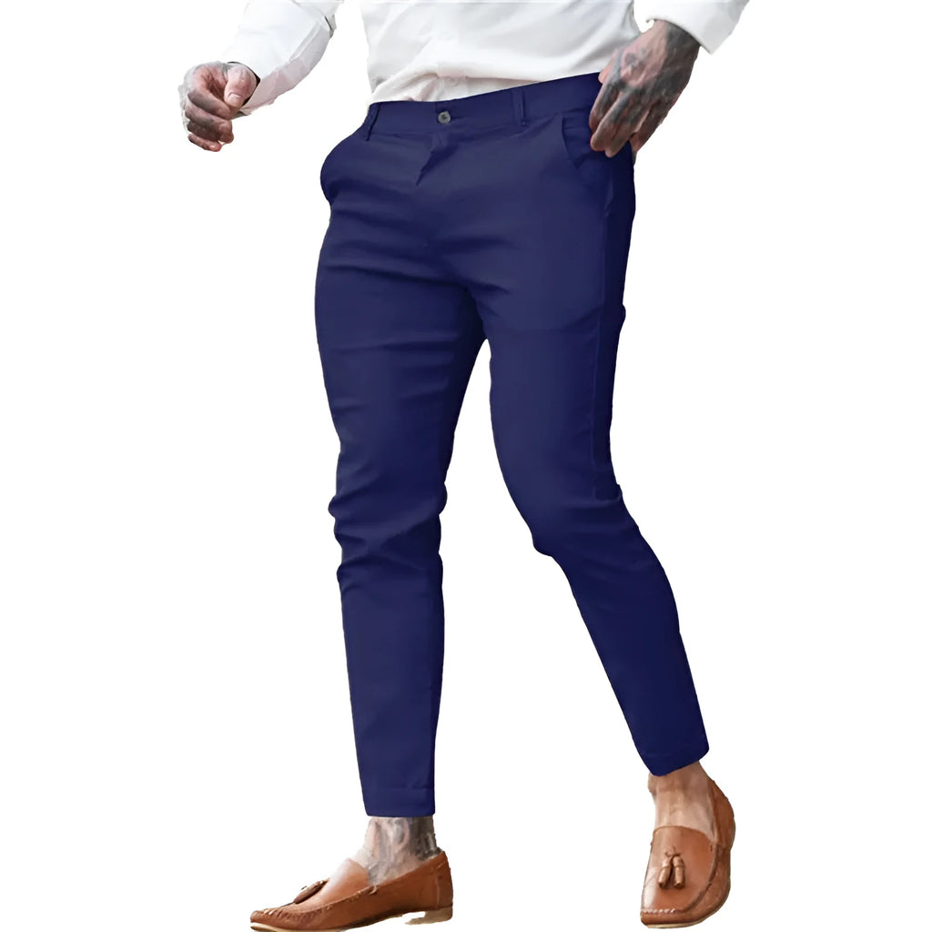 Men's slim fit pencil trousers in cotton twill stretch fabric on a hanger.