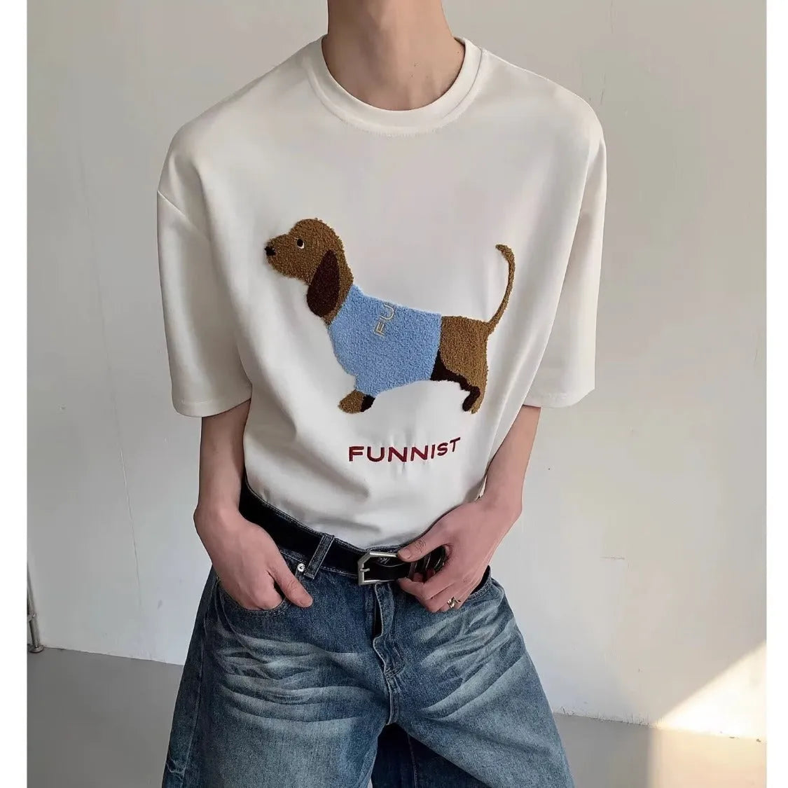 Grey men's short-sleeve cotton T-shirt with an embroidered sausage dog design on the chest.