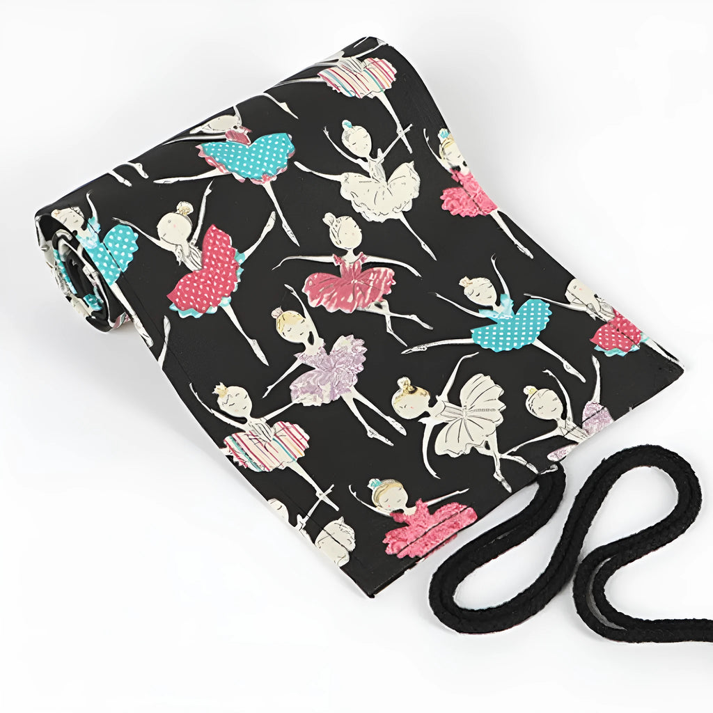 Square canvas pencil case with ballet girl print, showing multiple holes for organising pencils and stationery.