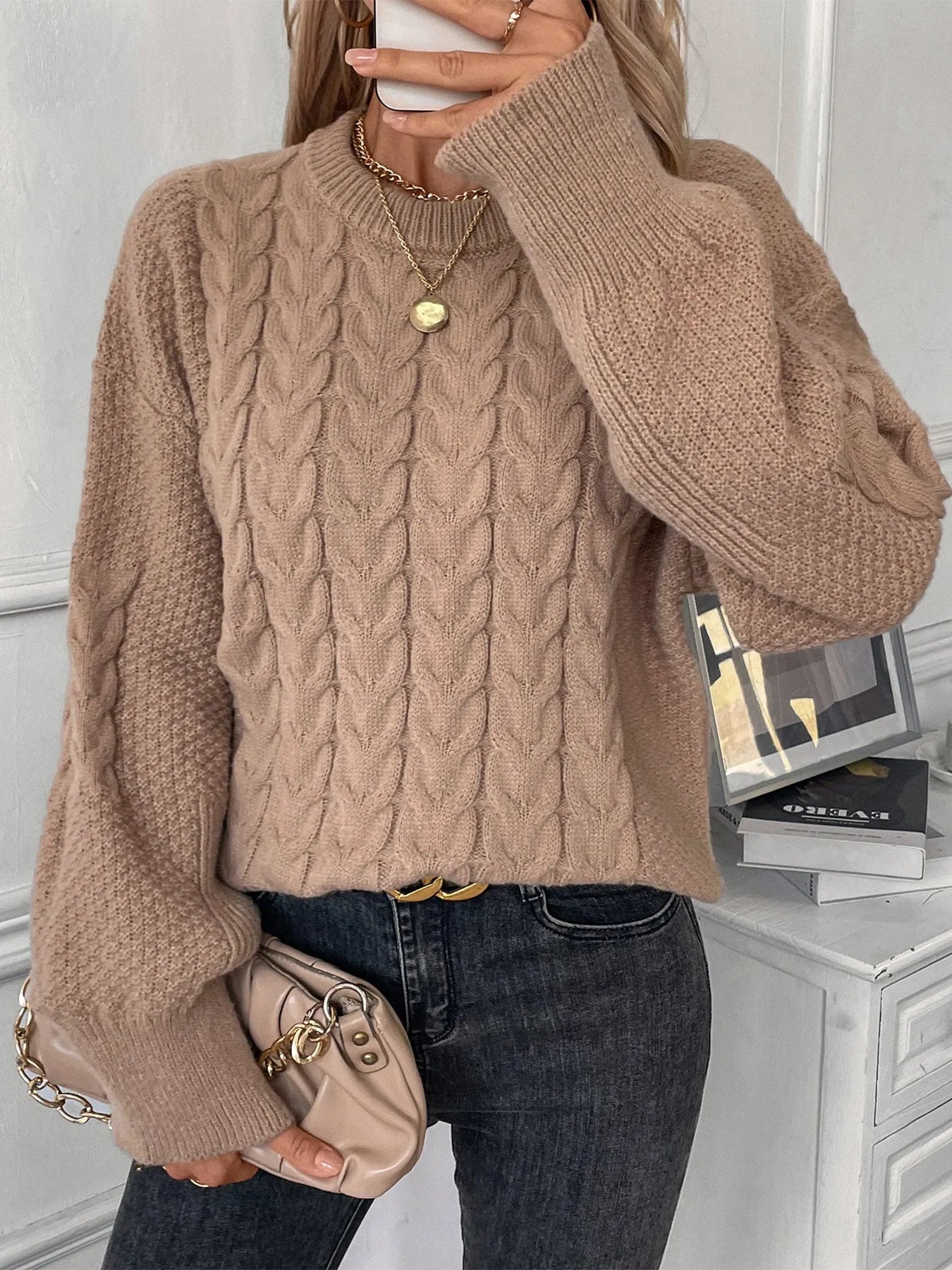 Women's beige loose pullover sweater with twist detail and round neck