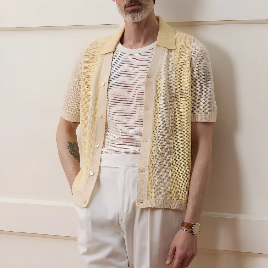 Yellow men's short-sleeve polo shirt with hollow-out design and asymmetric cut.