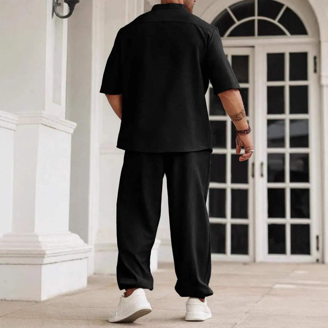 Men's apricot cotton linen casual short sleeve shirt and long trousers set laid flat.