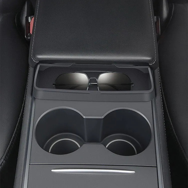Black silicone car glasses case attached to Tesla Model 3 armrest box for sunglasses storage