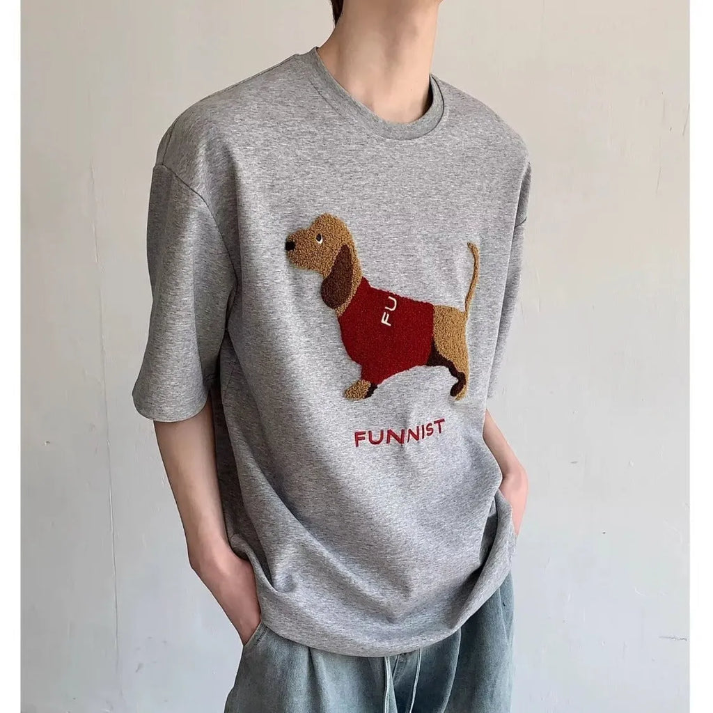 Grey men's short-sleeve cotton T-shirt with an embroidered sausage dog design on the chest.