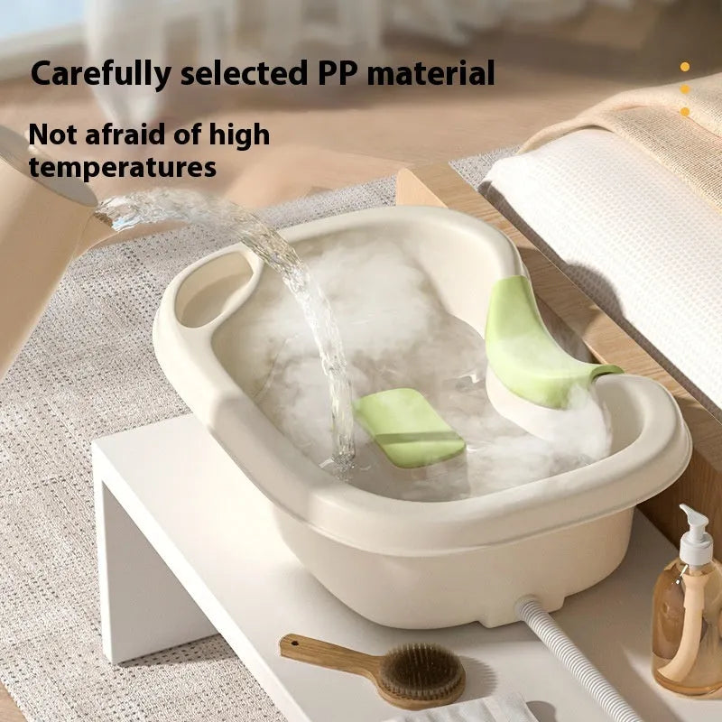 Portable plastic bed shampoo basin set with head pillow, water pump, and accessories in light pink colour.
