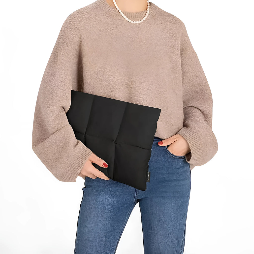 Soft fluffy laptop sleeve in black and khaki colours showing European American retro style design