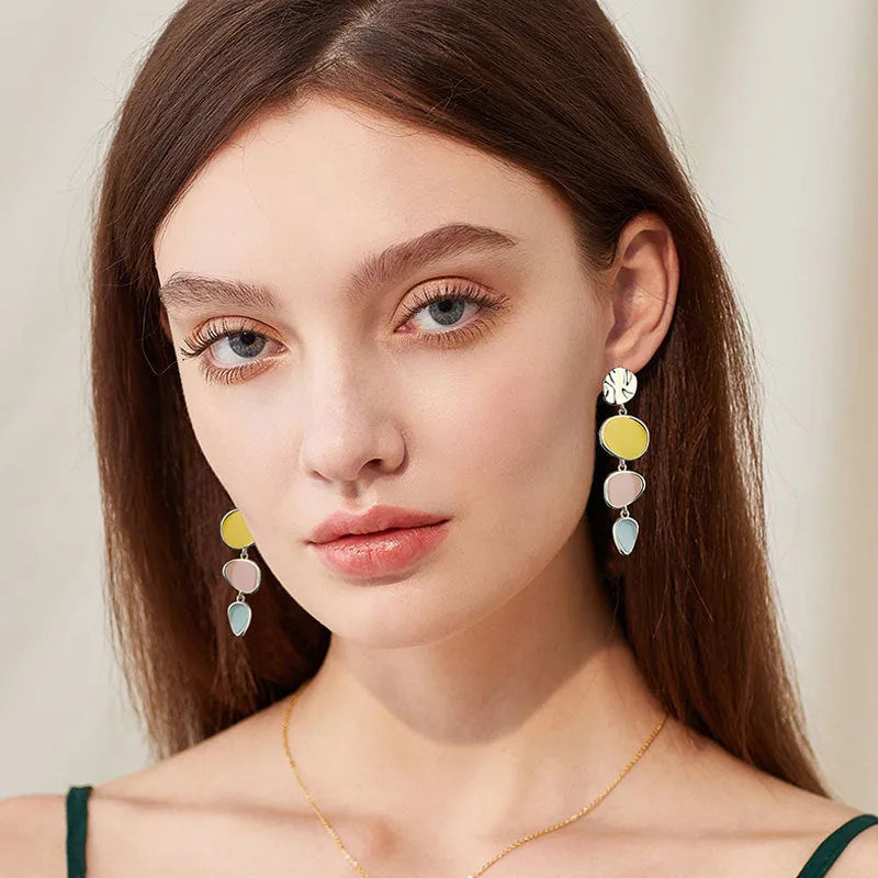 Morandi three-colour oil drip pattern on wafer-thin alloy disc earrings with sterling silver needles.