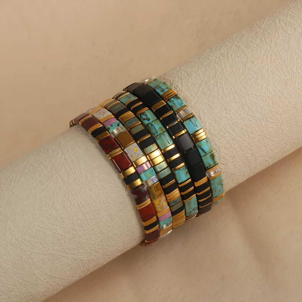 Geometric glass bead bracelet in round design with coloured glaze accents