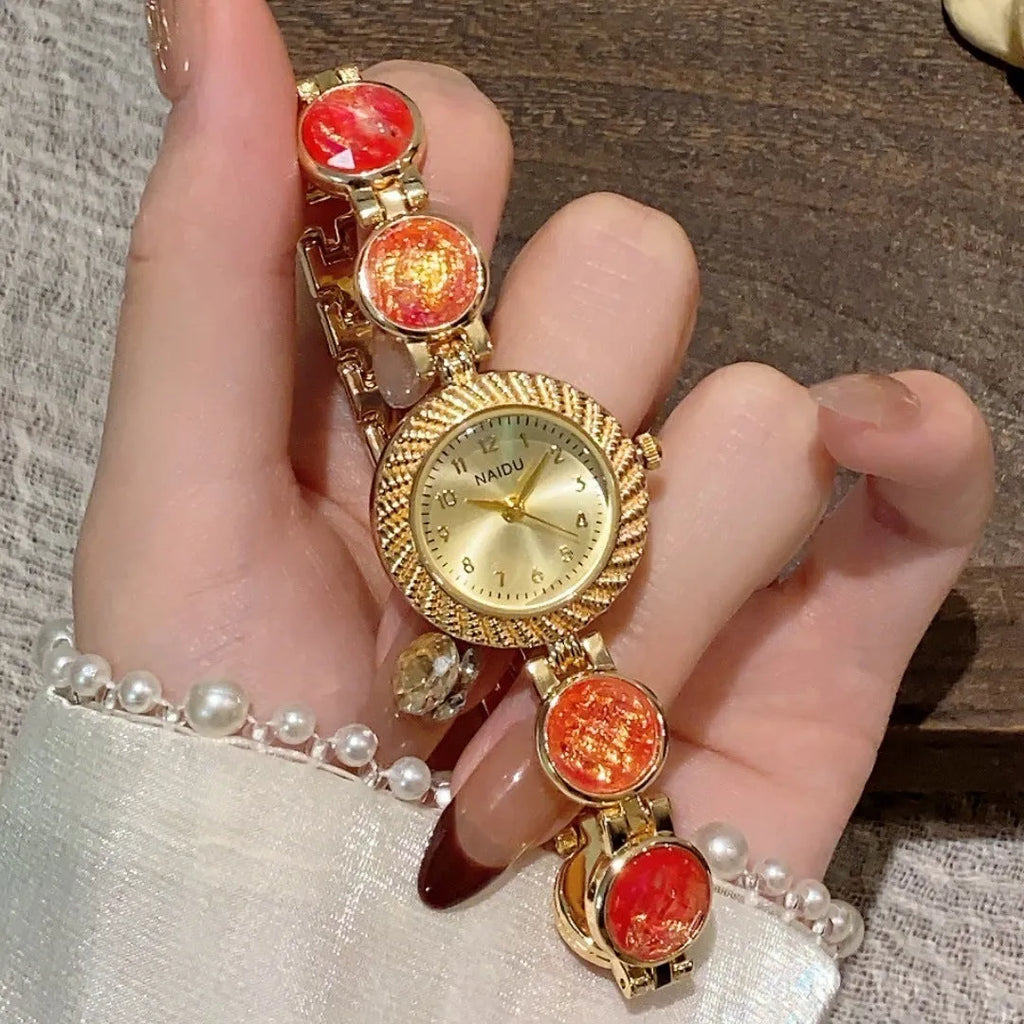 Women's round dial quartz watch in milky white with zinc alloy case and spiral crown.