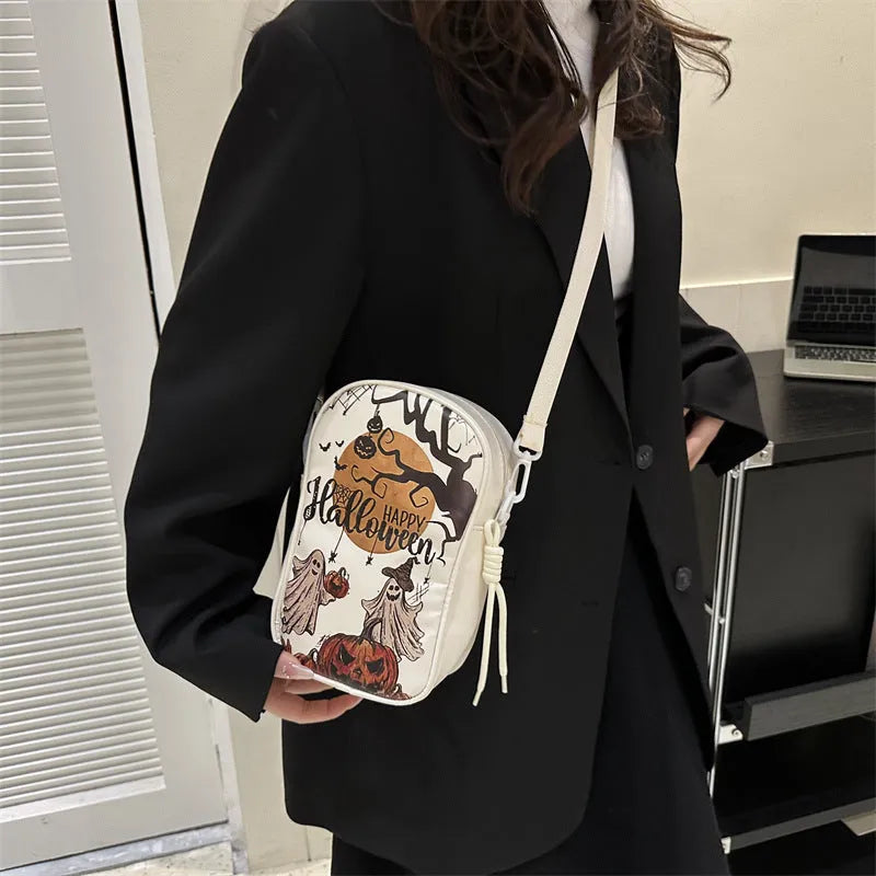Halloween graffiti print crossbody phone bag with pumpkin ghost bat design in PU material