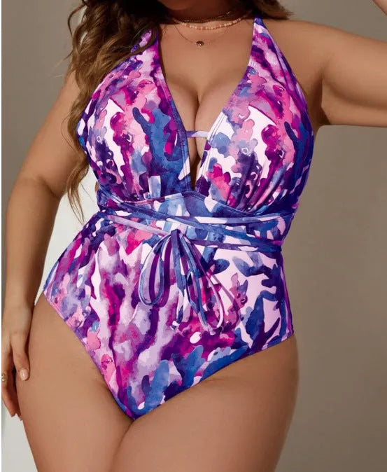 Purple halter neck one-piece swimsuit with European styling on adult female model
