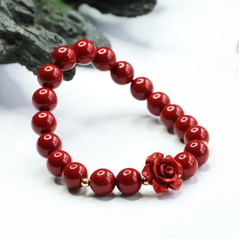 Natural cinnabar bracelet with 8mm rose-shaped beads in purple gold sandstone finish