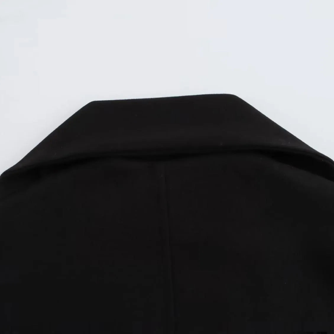 Women's longline polyester coat with artificial fur collar in street fashion style, shown in a choice of colours.